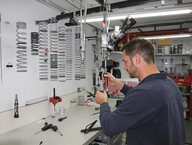 Stanton Garage Door Repair safety certified technician performing precision spring replacement in Stanton